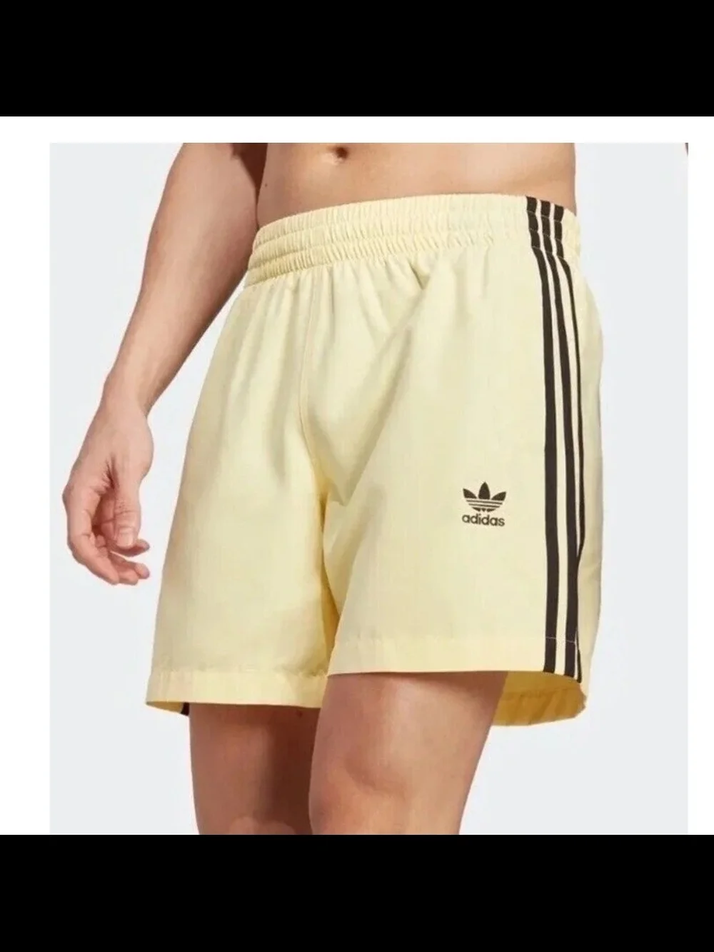 adidas Women’s Pale Yellow 3-Stripes Athletic Shorts